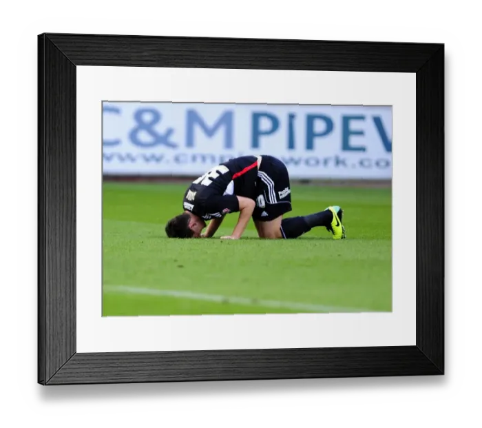Framed Print : Bristol City's Lewis Dunk Suffers Injury in Carlisle United Clash Framed Print : Bristol City's Lewis Dunk Suffers Injury in Carlisle United Clash