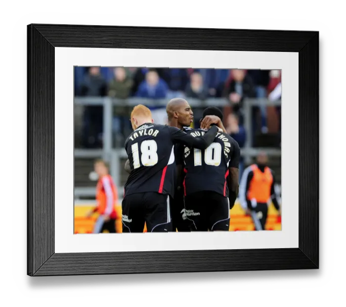 Framed Print : Celebrating Glory: Jay Emmanuel-Thomas, Marvin Elliott, and Ryan Taylor's Unforgettable Moment after Scoring for Bristol City against Carlisle United (26th October 2013)