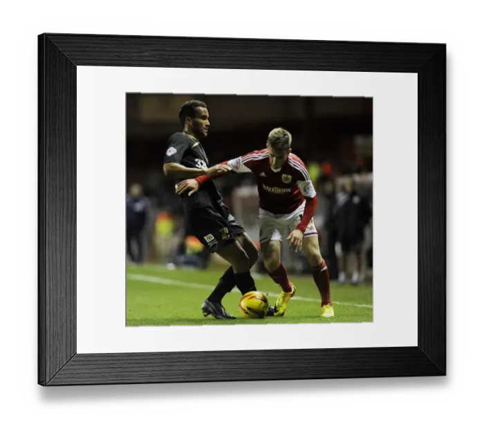 Framed Print : Bristol City's Joe Bryan Outmaneuvers Crawley Town's James Hurst During Sky Bet League One Clash at Ashton Gate Framed Print : Bristol City's Joe Bryan Outmaneuvers Crawley Town's James Hurst During Sky Bet League One Clash at Ashton Gate