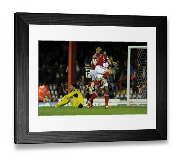 Framed Print : Bristol City: Jay Emmanuel-Thomas's Goal Celebration with Team Mates (vs. Crawley Town, 2013)