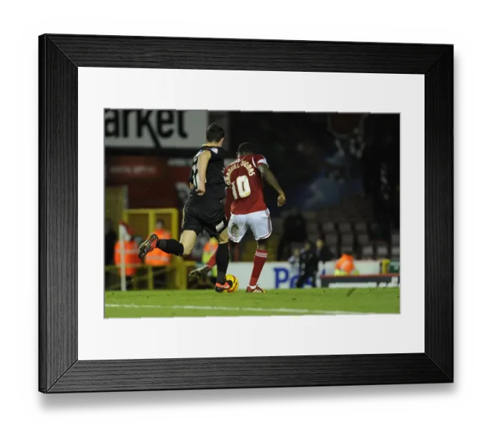 Framed Print : Jay Emmanuel-Thomas Scores Game-Winning Goal for Bristol City against Crawley Town (2013)