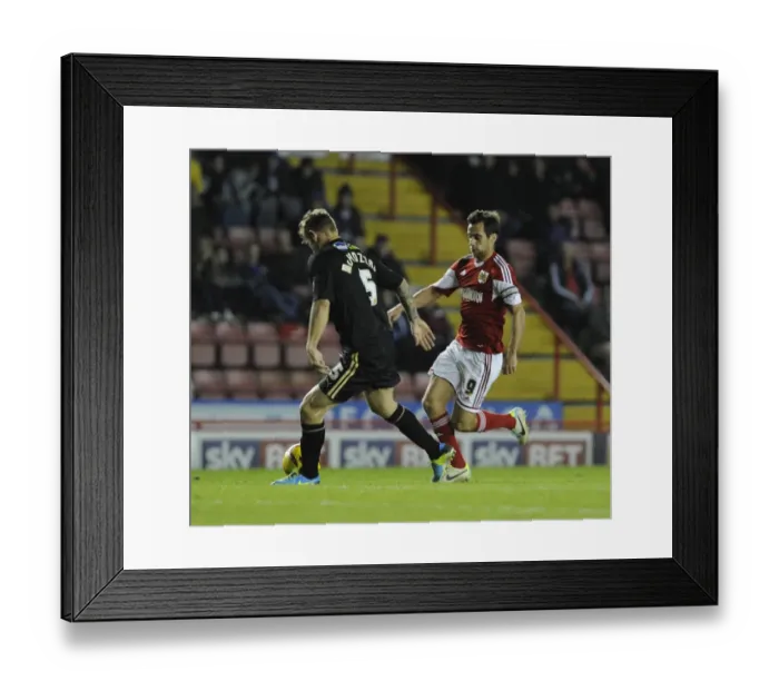 Framed Print : Bristol City's Sam Baldock Charges Forward Against Crawley Town's Kyle McFadzean in Sky Bet League One Clash