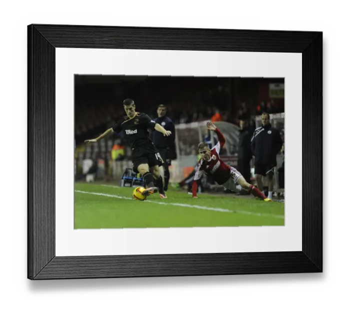 Framed Print : Bristol City vs Crawley Town: Joe Bryan Fights Off Jamie Proctor