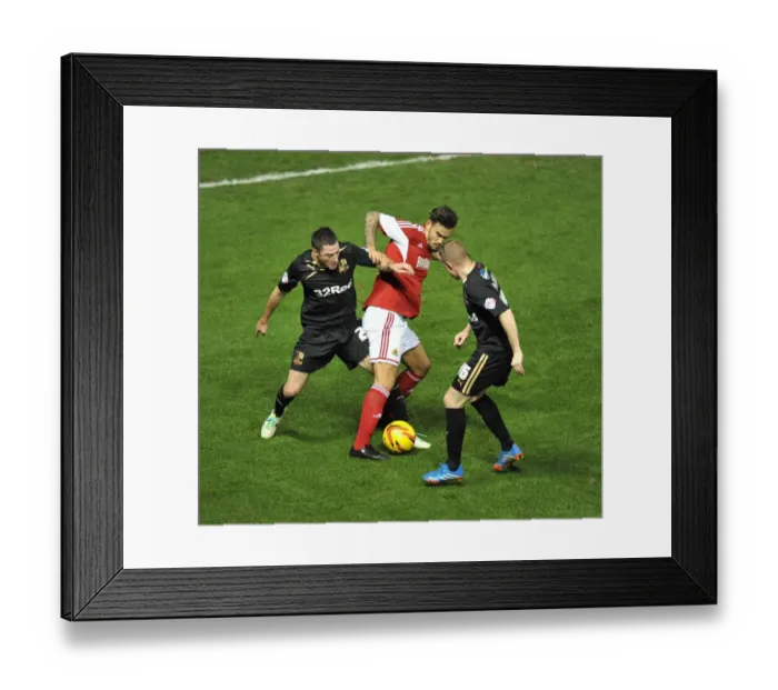 Framed Print : Marlon Pack Battles Past Two Crawley Defenders in Sky Bet League One Clash Framed Print : Marlon Pack Battles Past Two Crawley Defenders in Sky Bet League One Clash
