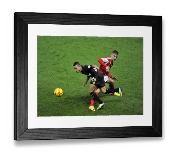 Framed Print : Bristol City's Joe Bryan Tackles in Barclays Premier League Clash Against Swansea City Framed Print : Bristol City's Joe Bryan Tackles in Barclays Premier League Clash Against Swansea City