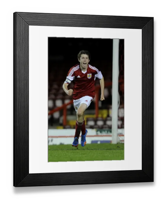 Framed Print : Bristol City U18s Celebrate Goal Against Newport County U18s in Youth Cup Match