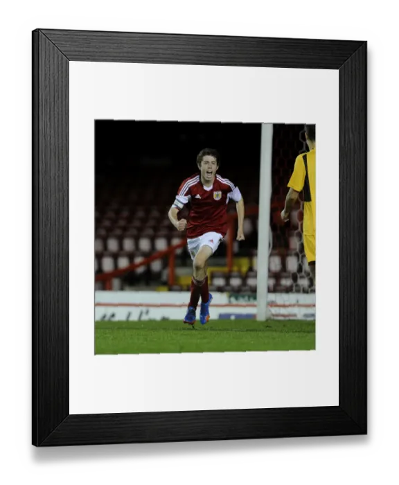 Framed Print : Bristol City's Tom Fry Euphoric After Scoring in Youth Cup Match Against Newport County Framed Print : Bristol City's Tom Fry Euphoric After Scoring in Youth Cup Match Against Newport County