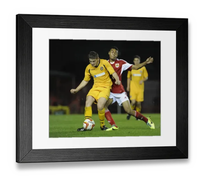 Framed Print : Intense Rivalry: Marley Bishop vs Ross Findlay in the Youth Cup Match at Ashton Gate Framed Print : Intense Rivalry: Marley Bishop vs Ross Findlay in the Youth Cup Match at Ashton Gate
