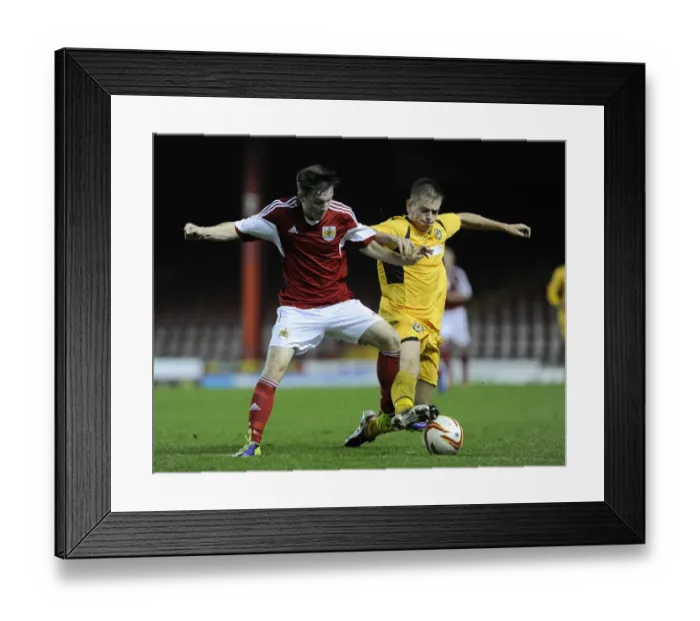 Framed Print : Tense Rivalry: Jamie Horgan vs. Lewis Holmes - Bristol City U18s vs. Newport County U18s Football Showdown Framed Print : Tense Rivalry: Jamie Horgan vs. Lewis Holmes - Bristol City U18s vs. Newport County U18s Football Showdown