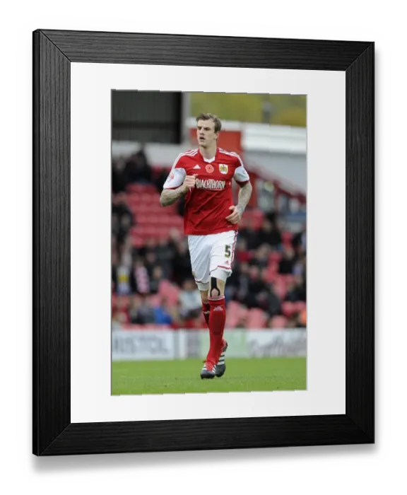 Framed Print : Aden Flint in Action: Bristol City vs Dagenham and Redbridge, FA Cup First Round at Ashton Gate
