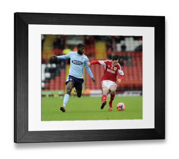 Framed Print : Bristol City's Greg Cunningham Defends Against Medy Elito in FA Cup Clash Framed Print : Bristol City's Greg Cunningham Defends Against Medy Elito in FA Cup Clash