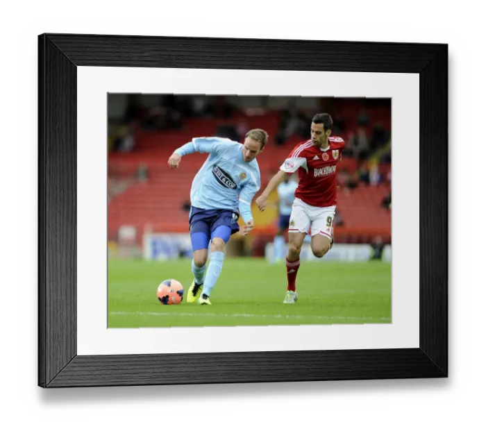 Framed Print : Bristol City's Sam Baldock Chases Down Dagenham & Redbridge's Scott Doe in FA Cup Action at Ashton Gate Framed Print : Bristol City's Sam Baldock Chases Down Dagenham & Redbridge's Scott Doe in FA Cup Action at Ashton Gate