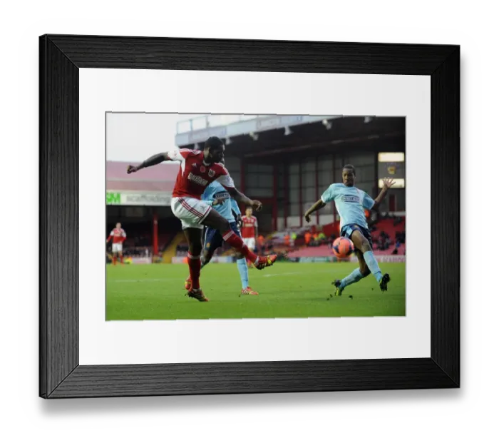 Framed Print : Bristol City's Jay Emmanuel-Thomas Goes for Glory in FA Cup Clash vs Dagenham and Redbridge Framed Print : Bristol City's Jay Emmanuel-Thomas Goes for Glory in FA Cup Clash vs Dagenham and Redbridge