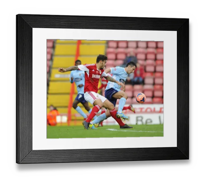 Framed Print : Maron Pack vs. Luke Howell: Intense Battle for Ball Possession in Bristol City vs. Dagenham and Redbridge FA Cup Match Framed Print : Maron Pack vs. Luke Howell: Intense Battle for Ball Possession in Bristol City vs. Dagenham and Redbridge FA Cup Match
