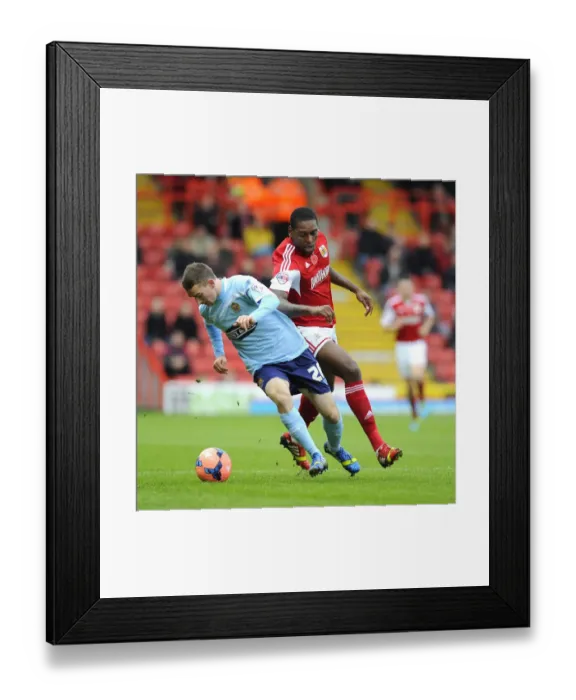 Framed Print : Battling for Supremacy: Jay Emmanuel-Thomas vs Jack Connors in the FA Cup Clash between Bristol City and Dagenham and Redbridge Framed Print : Battling for Supremacy: Jay Emmanuel-Thomas vs Jack Connors in the FA Cup Clash between Bristol City and Dagenham and Redbridge