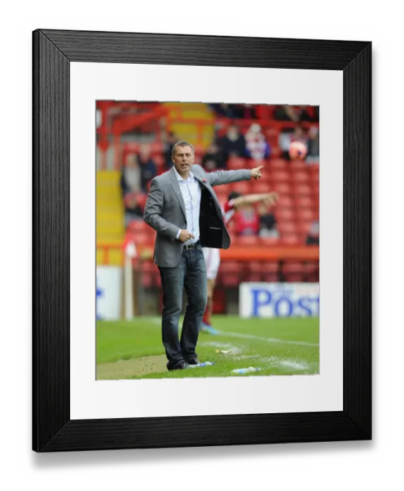 Framed Print : Wayne Burnett Leads Dagenham & Redbridge in FA Cup Clash at Ashton Gate Framed Print : Wayne Burnett Leads Dagenham & Redbridge in FA Cup Clash at Ashton Gate
