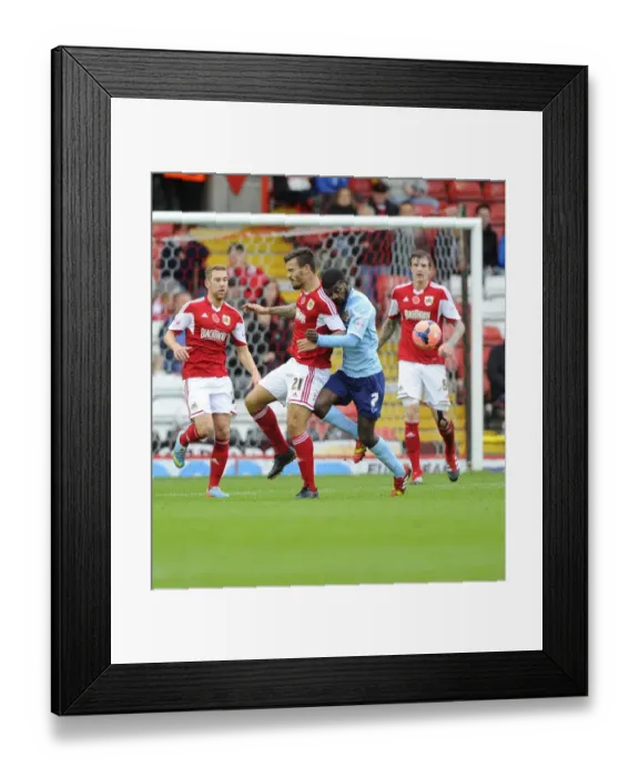 Framed Print : Maron Pack Fouled by Medy Elito in FA Cup Match: Bristol City vs Dagenham and Redbridge