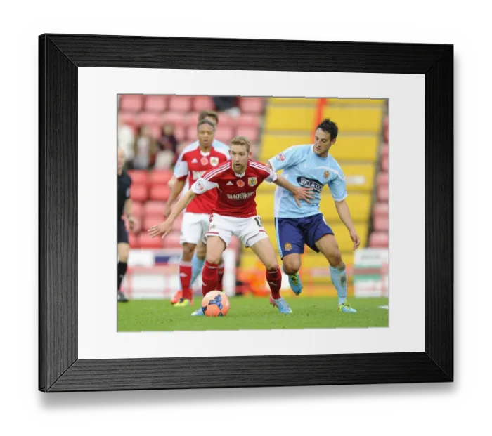 Framed Print : Battling for Supremacy: Wagstaff vs. Howell in the FA Cup Clash between Bristol City and Dagenham and Redbridge