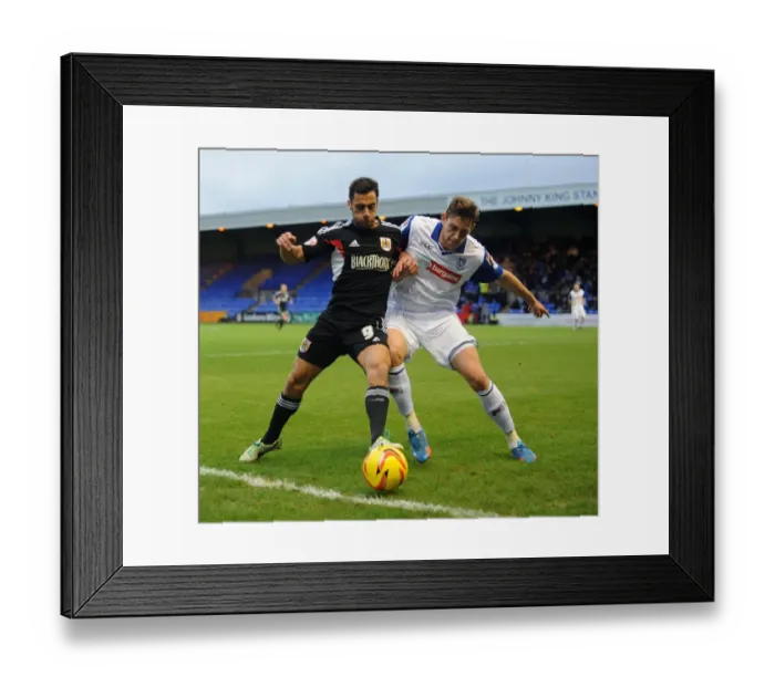 Framed Print : Bristol City's Sam Baldock vs Tranmere's Ash Taylor in Sky Bet League One Clash at Prenton Park Framed Print : Bristol City's Sam Baldock vs Tranmere's Ash Taylor in Sky Bet League One Clash at Prenton Park