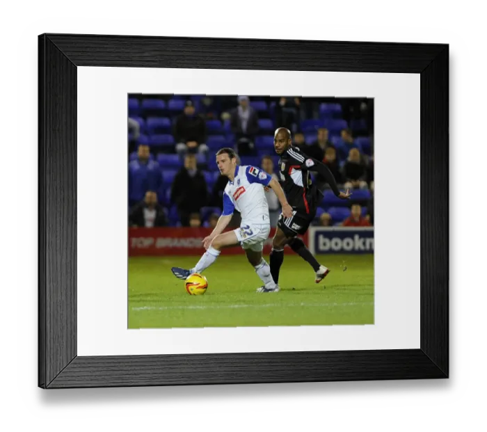 Framed Print : Bristol City's Marvin Elliott Closes In on Tranmere's Jason Koumas during Sky Bet League One Match