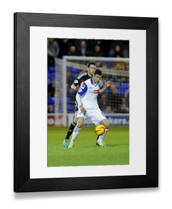 Framed Print : Tranmere's Jake Kirby Holds Off Brendan Moloney of Bristol City in Sky Bet League One Clash at Prenton Park