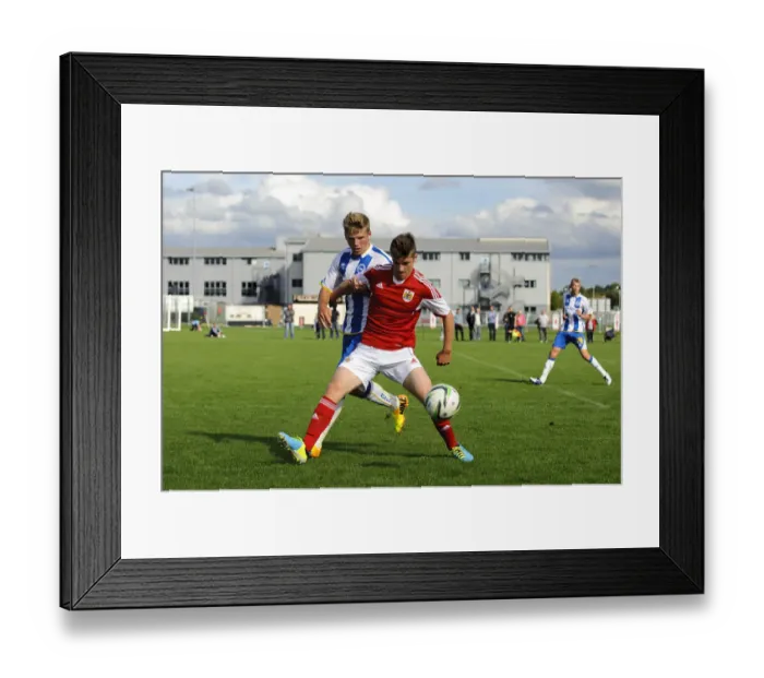 Framed Print : Clash on the Field: Scott Bevan vs. Will Collar - U18 Football Rivalry Framed Print : Clash on the Field: Scott Bevan vs. Will Collar - U18 Football Rivalry