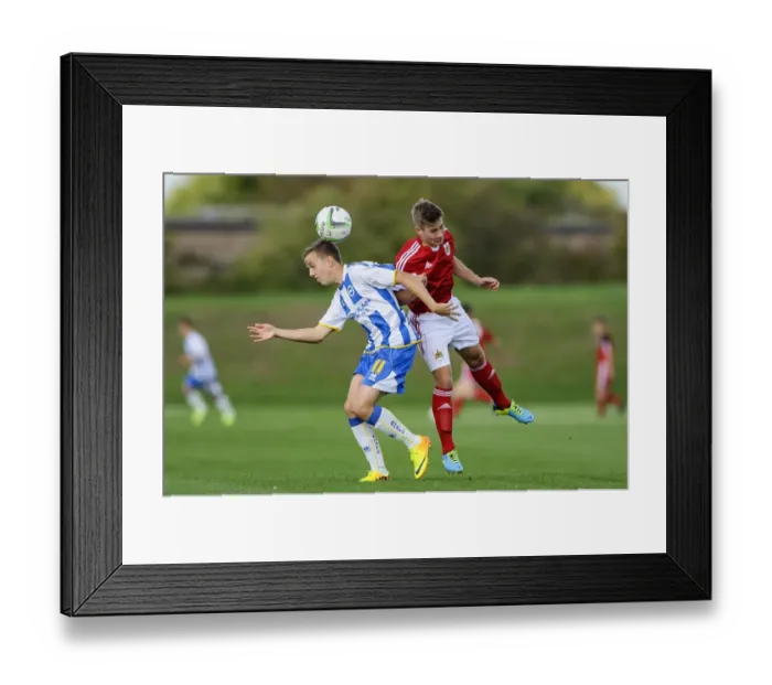 Framed Print : Intense Aerial Battle: Jordan Drew vs Ben Withey, U18 Football Rivalry Framed Print : Intense Aerial Battle: Jordan Drew vs Ben Withey, U18 Football Rivalry