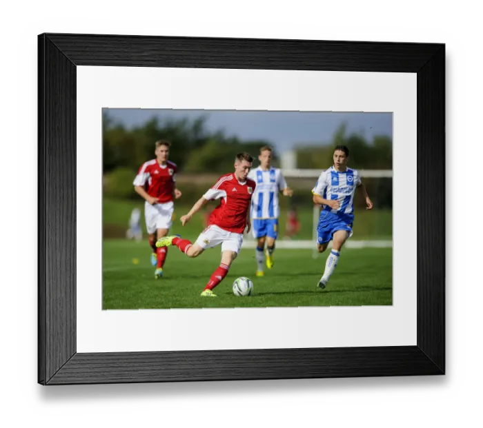 Framed Print : Clash of the Young Defenders: Jamie Horgan vs Dylan Barnett - Intense Rivalry in U18 Football
