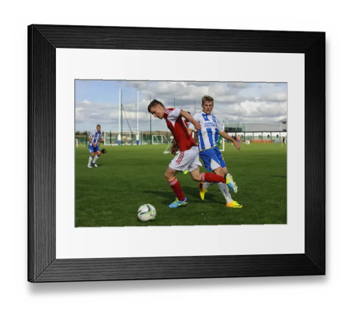 Framed Print : Bristol City U18 vs Brighton U18: Clash between Bevan and Collar at SGS Wise Campus