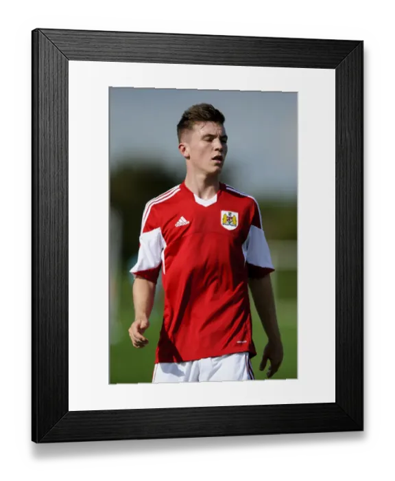 Framed Print : Focused Jamie Horgan of Bristol City U18 during U18 Professional Development League Match against Brighton & Hove Albion - October 2013