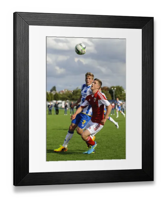 Framed Print : Clash at SGS Wise Campus: Bevan vs Collar - Intense Moment from Bristol City U18 vs Brighton & Hove Albion U18 Football Match Framed Print : Clash at SGS Wise Campus: Bevan vs Collar - Intense Moment from Bristol City U18 vs Brighton & Hove Albion U18 Football Match
