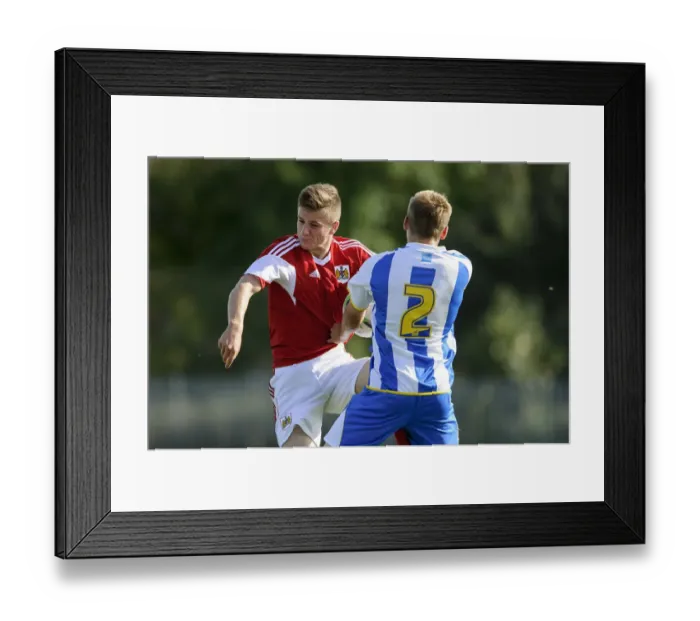 Framed Print : Intense Aerial Battle: Scott Bevan vs Will Collar, U18 Football Rivalry - October 2013 Framed Print : Intense Aerial Battle: Scott Bevan vs Will Collar, U18 Football Rivalry - October 2013