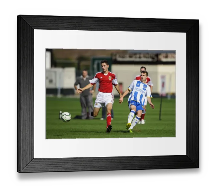 Framed Print : Clash of Talents: Last vs Hutchinson - U18 Football Rivalry