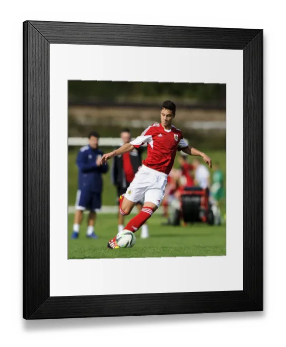 Framed Print : Young Star Aron Davies Dazzles in Bristol City U18's Win Against Brighton & Hove Albion