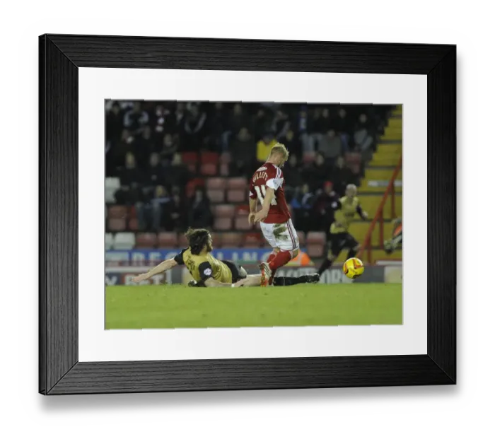 Framed Print : Intense Sky Bet League One Clash: Simon Gillett Tackled by Leyton Orient Player Framed Print : Intense Sky Bet League One Clash: Simon Gillett Tackled by Leyton Orient Player
