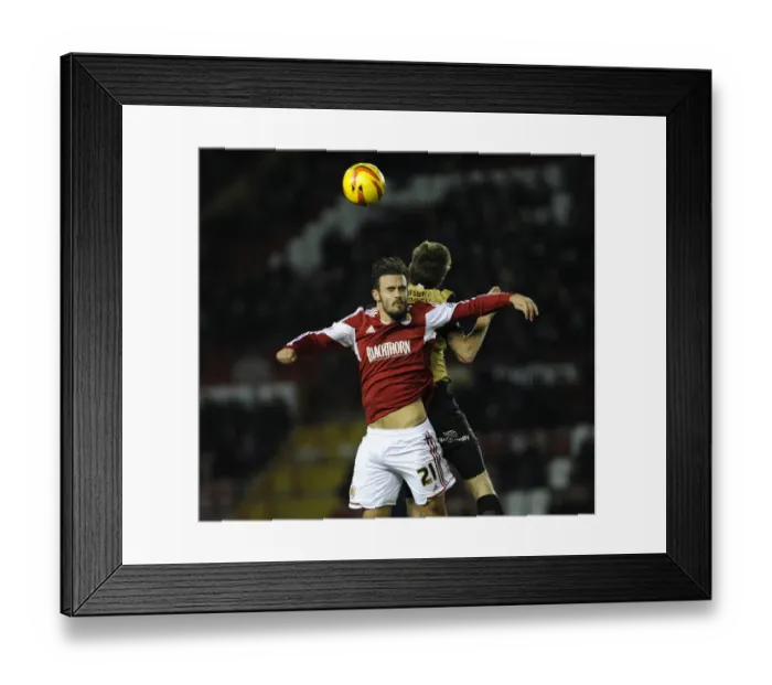 Framed Print : Maron Pack vs. David Mooney: Intense Battle for the Ball at Ashton Gate, Bristol City vs. Leyton Orient (November 2013)