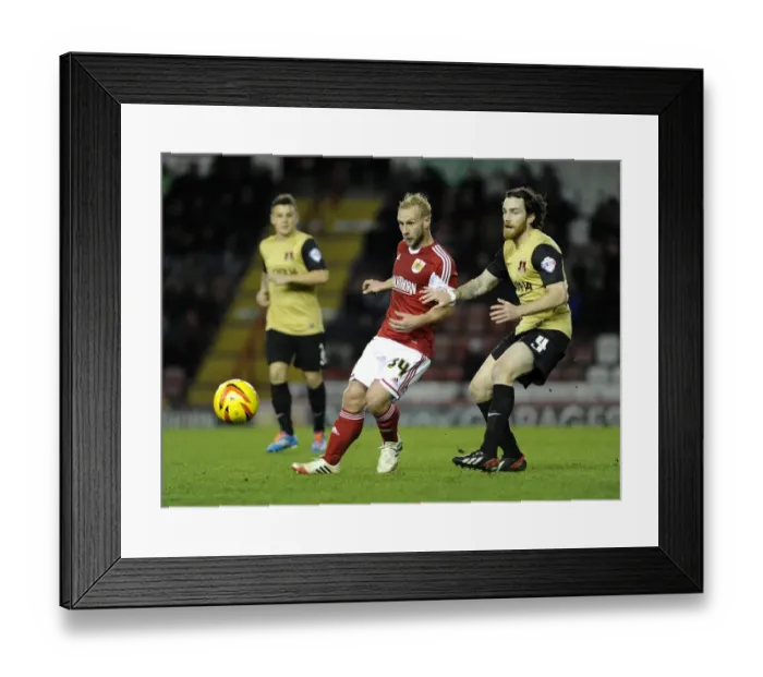 Framed Print : Bristol City's Simon Gillett Evades Challenge from Leyton Orient's Romain Vincelot