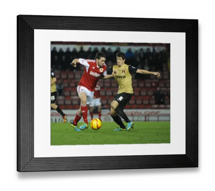 Framed Print : Bristol City vs Leyton Orient: Intense Moment as Brendan Moloney Clashes with Lloyd James