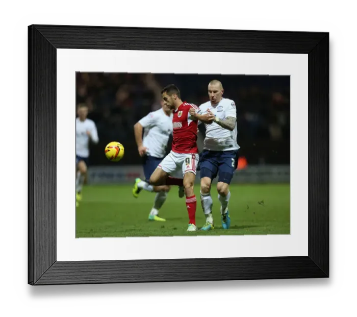 Framed Print : Battling For Supremacy: Sam Baldock vs Jack King in Preston North End vs Bristol City Clash