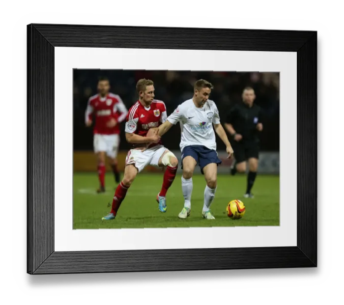 Framed Print : Battling Midfielders: Wagstaff vs Byrom - Preston North End vs Bristol City Clash