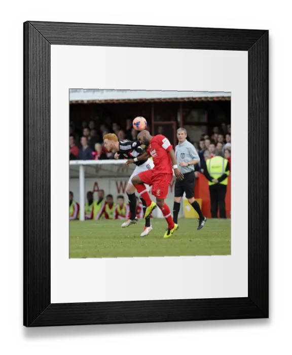 Framed Print : Bristol City vs Tamworth: Intense Aerial Battle Between Ryan Taylor and Wayne Thomas Framed Print : Bristol City vs Tamworth: Intense Aerial Battle Between Ryan Taylor and Wayne Thomas