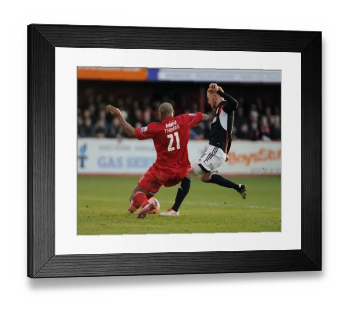 Framed Print : Tamworth's Wayne Thomas Blocks Ryan Taylor's Shot – FA Cup Second Round Tussle at Tamworth's The Lamb Ground Framed Print : Tamworth's Wayne Thomas Blocks Ryan Taylor's Shot – FA Cup Second Round Tussle at Tamworth's The Lamb Ground