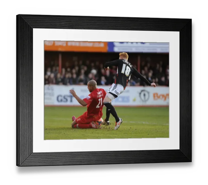 Framed Print : Tamworth's Wayne Thomas Denies Ryan Taylor's Shot in FA Cup Second Round Clash Framed Print : Tamworth's Wayne Thomas Denies Ryan Taylor's Shot in FA Cup Second Round Clash