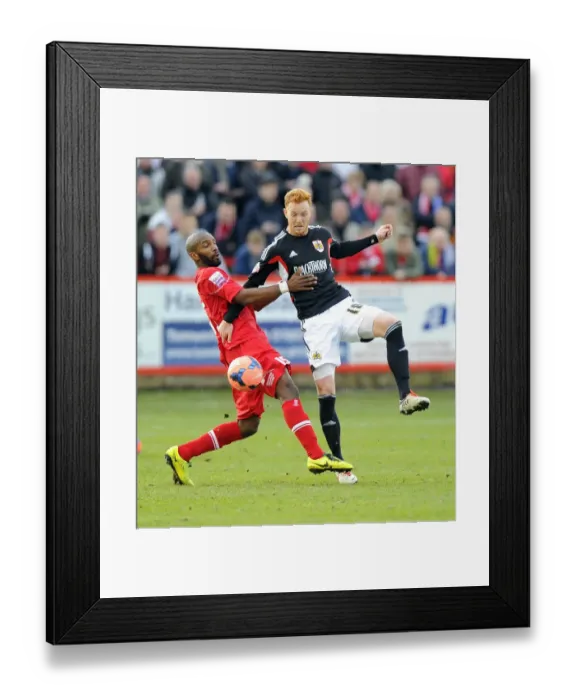 Framed Print : Battling for Supremacy: Ryan Taylor vs. Duane Courtney in FA Cup Clash