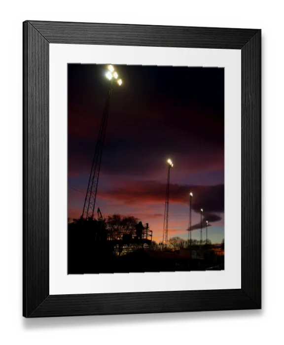 Framed Print : FA Cup Sunset: ITV Cameraman and Floodlights Silhouetted at Tamworth's The Lamb Ground Framed Print : FA Cup Sunset: ITV Cameraman and Floodlights Silhouetted at Tamworth's The Lamb Ground