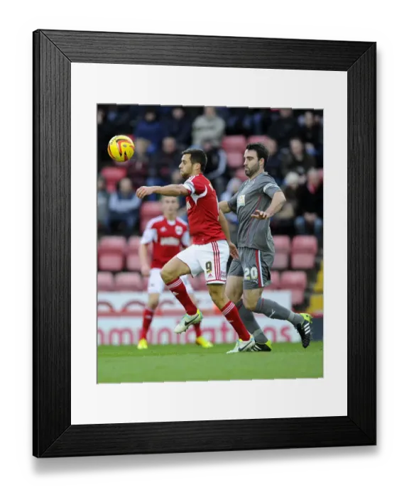 Framed Print : Battling for Supremacy: Sam Baldock vs Craig Morgan in Bristol City vs Rotherham United Football Match, December 14, 2013