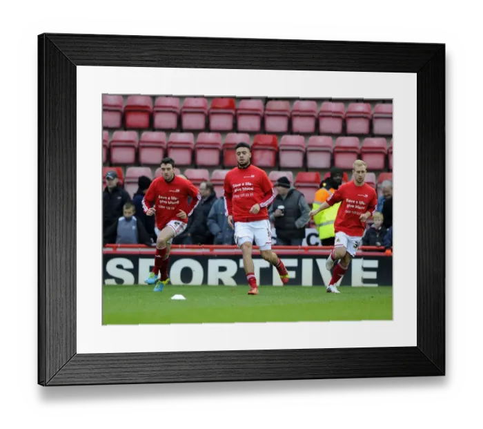 Framed Print : Bristol City Players Warm Up Ahead of Rotherham United Clash at Ashton Gate Framed Print : Bristol City Players Warm Up Ahead of Rotherham United Clash at Ashton Gate