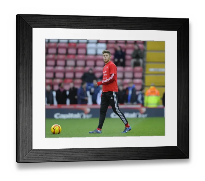 Framed Print : Bristol City's Wes Burns Warming Up Ahead of Rotherham United Clash at Ashton Gate Framed Print : Bristol City's Wes Burns Warming Up Ahead of Rotherham United Clash at Ashton Gate