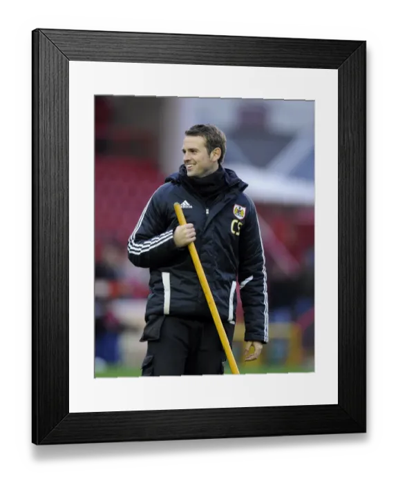 Framed Print : Laughing Groomsman Evades Stray Football Ball at Bristol City vs Rotherham United