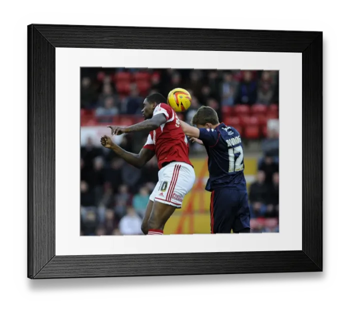 Framed Print : Bristol City vs Walsall: Intense Aerial Battle Between Jay Emmanuel-Thomas and Paul Downing Framed Print : Bristol City vs Walsall: Intense Aerial Battle Between Jay Emmanuel-Thomas and Paul Downing